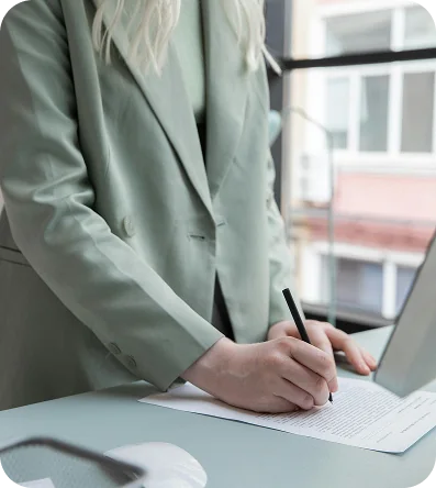 Secretary writing company documents